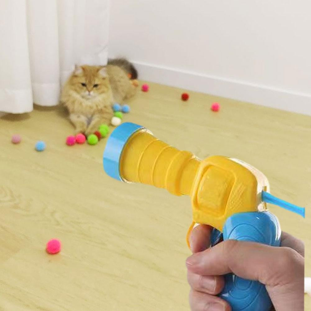 Pistola lança bolas para gatos